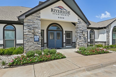 the front of the riverside apartments building